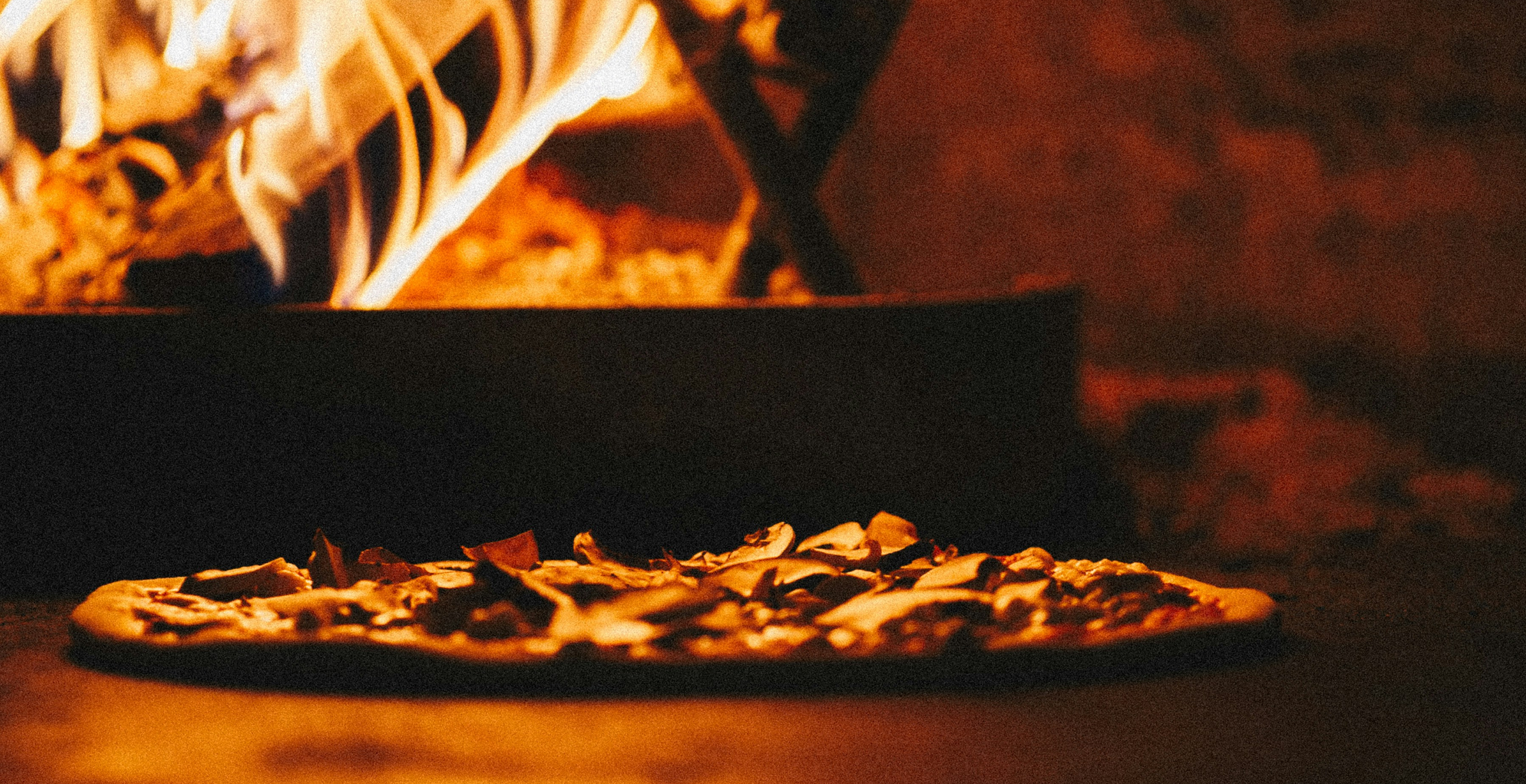 Pizza traditionnelle cuite au feu de bois - Christian's Pizza